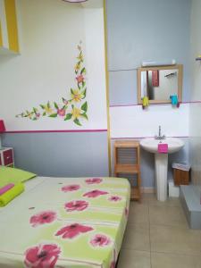 Postel nebo postele na pokoji v ubytování Hotel De la Plage