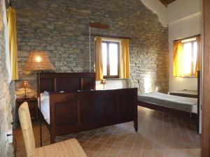 A bed or beds in a room at Buchere Ville