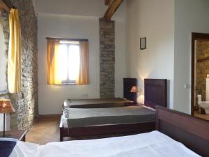 A bed or beds in a room at Buchere Ville