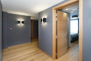 Postel nebo postele na pokoji v ubytování Buzë Boutique Hotel