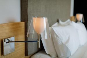 Postel nebo postele na pokoji v ubytování Buzë Boutique Hotel