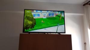 A television and/or entertainment centre at Efstathiou Mihail Studios and Apartments