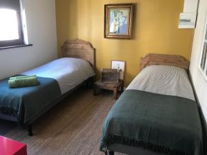 Voodi või voodid majutusasutuse B&B du Cloître toas