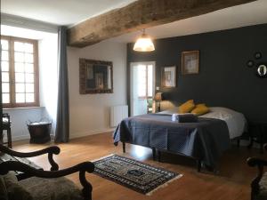 Voodi või voodid majutusasutuse B&B du Cloître toas