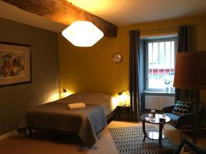 Voodi või voodid majutusasutuse B&B du Cloître toas