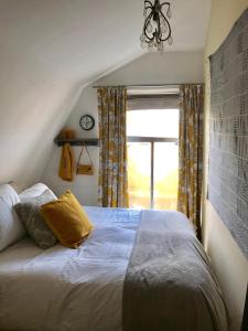 Tempat tidur dalam kamar di Charming countryhouse near Amsterdam