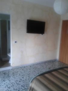 Televízia a/alebo spoločenská miestnosť v ubytovaní Bed And Breakfast Il Subacqueo