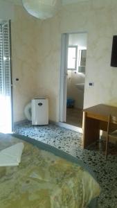 Postel nebo postele na pokoji v ubytování Bed And Breakfast Il Subacqueo