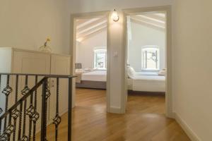 Posteľ alebo postele v izbe v ubytovaní Pithari House