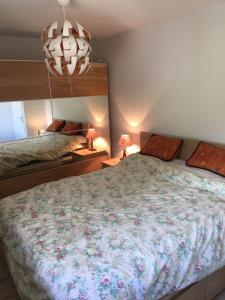 Postel nebo postele na pokoji v ubytování Appartement face au Mont Blanc & Glaciers
