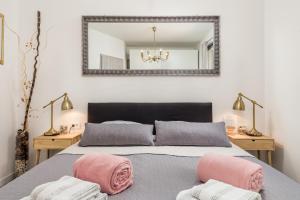 Llit o llits en una habitació de Fara apartment