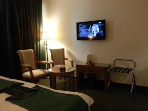 Μια τηλεόραση ή/και κέντρο ψυχαγωγίας στο La Rosa Hotel By Brother International