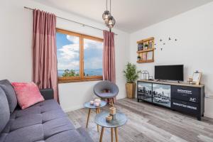 Svetainės erdvė apgyvendinimo įstaigoje Fara apartment