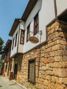 a building with a sign on the side of it at The Ninova in Antalya