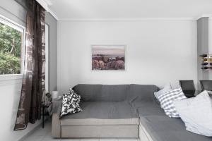 A seating area at Nikiti Maisonette on the beach by Luxlikehome