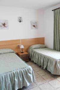 Cama o camas de una habitación en Apartamentos Las Americas - Blanes Beach