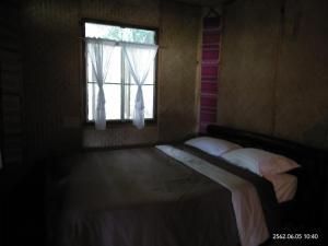 Voodi või voodid majutusasutuse Baan Suan Jantra Home Stay toas