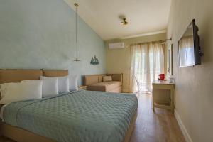 Posteľ alebo postele v izbe v ubytovaní Panas Hotel