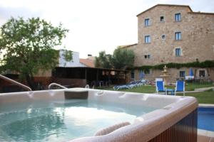 Bazén v ubytovaní Hotel Sant Joan alebo v jeho blízkosti
