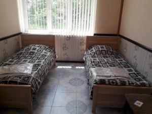 Postel nebo postele na pokoji v ubytování Javakhet