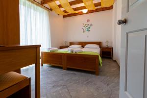 Posteľ alebo postele v izbe v ubytovaní Iris Apartments