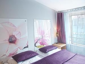 Posteľ alebo postele v izbe v ubytovaní Hotel Secesja
