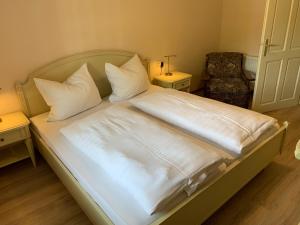 Ein Bett oder Betten in einem Zimmer der Unterkunft Haus Gasserer