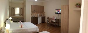 TV a/nebo společenská místnost v ubytování Hotel Tao