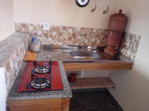 Kuchyň nebo kuchyňský kout v ubytování Chalé Morada das estrelas