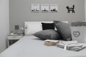 Säng eller sängar i ett rum på Vacanze HOME