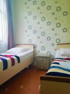 Postel nebo postele na pokoji v ubytování Guest House Carpediem
