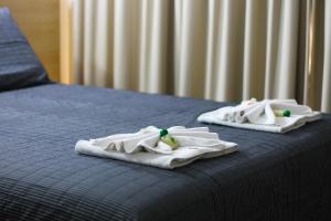 Llit o llits en una habitació de Hotel Urupes
