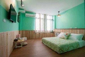 Postel nebo postele na pokoji v ubytování It's a Good Time Homestay + 25 fotografií