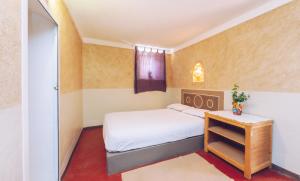 Ένα ή περισσότερα κρεβάτια σε δωμάτιο στο Monkey Fingers House by Fatima mellal