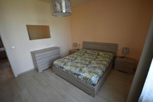 A bed or beds in a room at LA CASA DI CHIANNI La Pieve