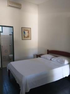 Postel nebo postele na pokoji v ubytování Pousada do Ipe