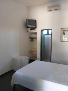 Postel nebo postele na pokoji v ubytování Pousada do Ipe