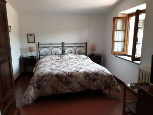 Posteľ alebo postele v izbe v ubytovaní Albergo Giovanni Da Verrazzano