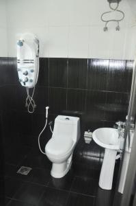 Vonios kambarys apgyvendinimo įstaigoje Al Sqlawi Hotel Apartments