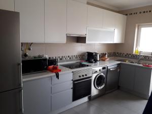 Kuchyň nebo kuchyňský kout v ubytování Casa da Sardinha + 20 fotografií