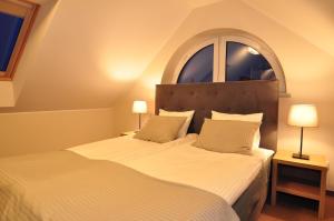 Postel nebo postele na pokoji v ubytování Piaskowy 2