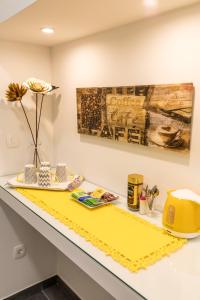 a yellow counter top in a room with a yellow at SeaBed Rooms Split in Split