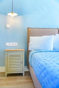 Posteľ alebo postele v izbe v ubytovaní Panas Hotel