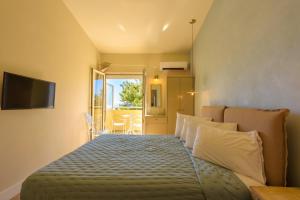 Posteľ alebo postele v izbe v ubytovaní Panas Hotel