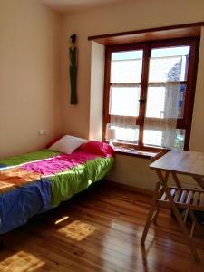 Postel nebo postele na pokoji v ubytování Soleado En Esterri
