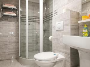Kúpeľňa v ubytovaní White Rose apartment + 24 fotografií