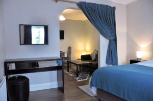מיטה או מיטות בחדר ב-Killilagh House Accommodation