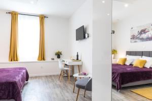 Ένα ή περισσότερα κρεβάτια σε δωμάτιο στο SeaBed Rooms2 Split