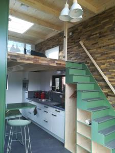 Dapur atau dapur kecil di Trendy Tiny Houses Bovenweg