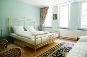 سرير أو أسرّة في غرفة في Apartment Zentral